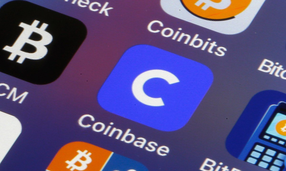 Coinbase Cuts 14% of Staff, Citing Volatility and AI Efficiency